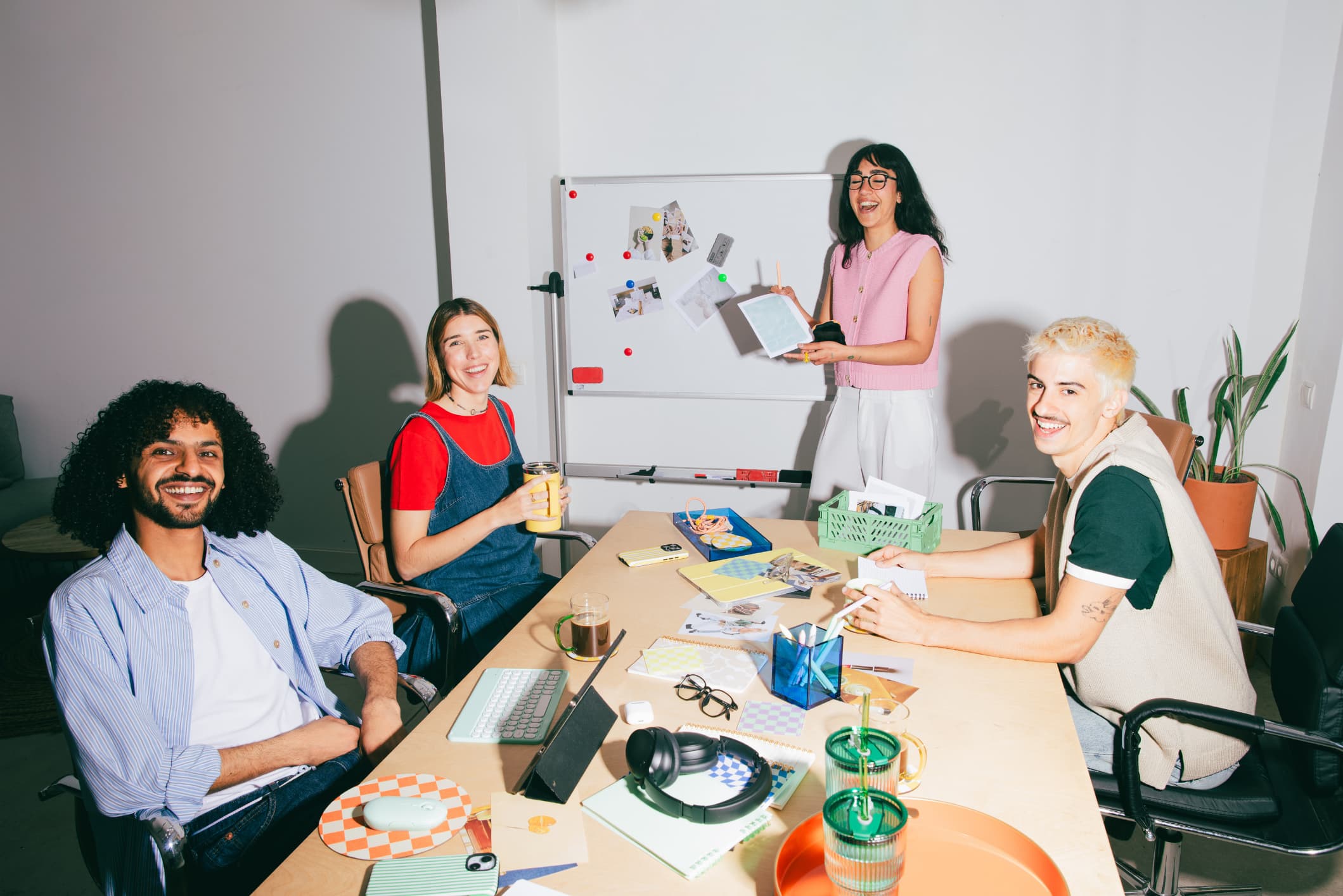 Four marketing people working together at a table.